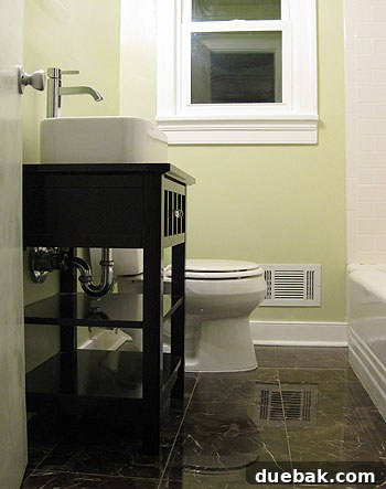Completed DIY bathroom vanity with vessel sink