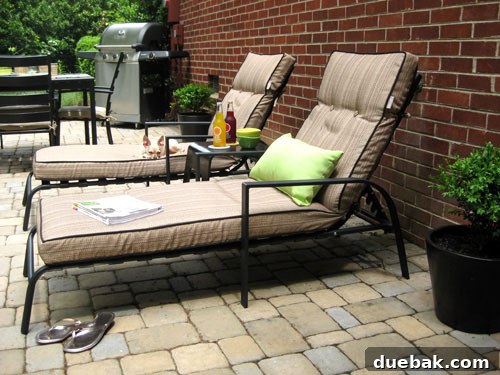 Comfortable lounge chairs on a sunny outdoor patio