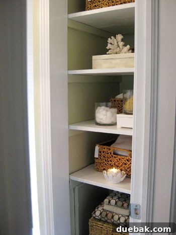 organized-linen-closet-baskets
