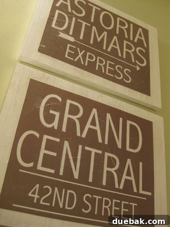 Crafting Vintage Wood and Paper Wall Signs 15 Close-up detail of a distressed sign above a toilet
