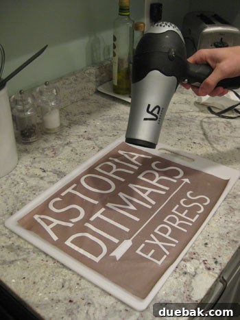 Crafting Vintage Wood and Paper Wall Signs 9 Hairdryer drying a distressed paper print