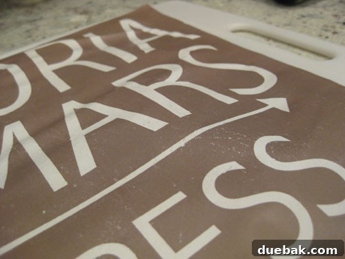 Crafting Vintage Wood and Paper Wall Signs 10 Close-up of a distressed paper print showing worn areas