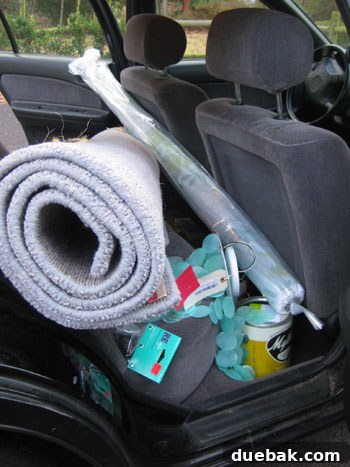 Choosing Nursery Rugs and Curtain Fabric 3 Car full of nursery shopping items