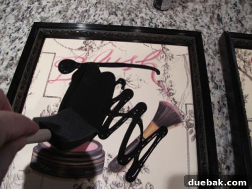 Wine Cork Memo Masterpiece 3 Emily painting the inside of the picture frames black to provide a clean background for the wine corks.