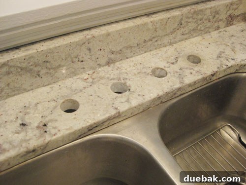 Clean countertop holes after faucet removal