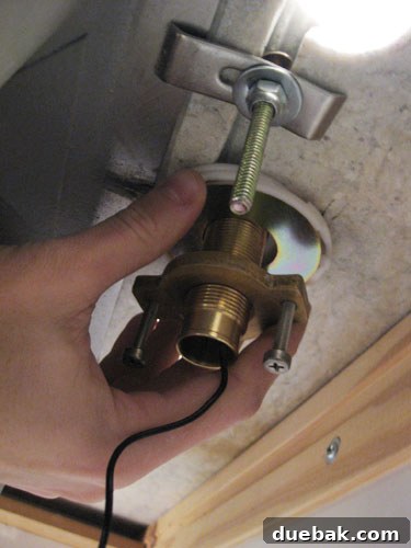 Installing the gooseneck spout of the Delta faucet