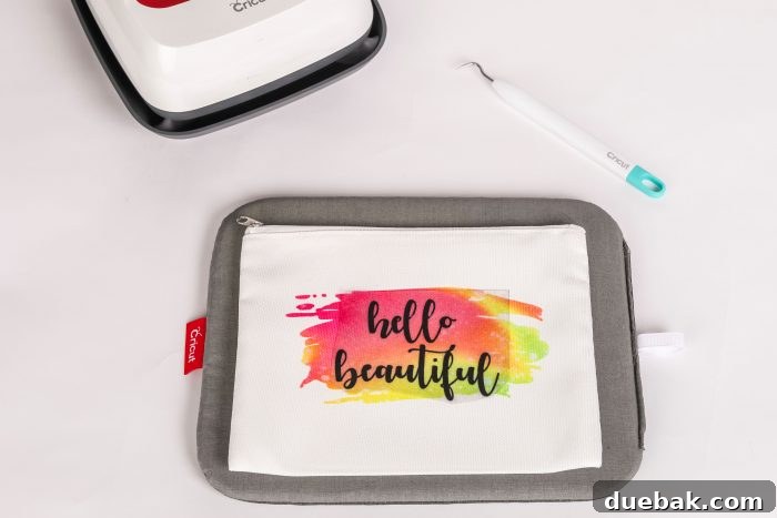Craft a Custom Infusible Ink Makeup Bag 9 Applying iron-on vinyl over Infusible Ink