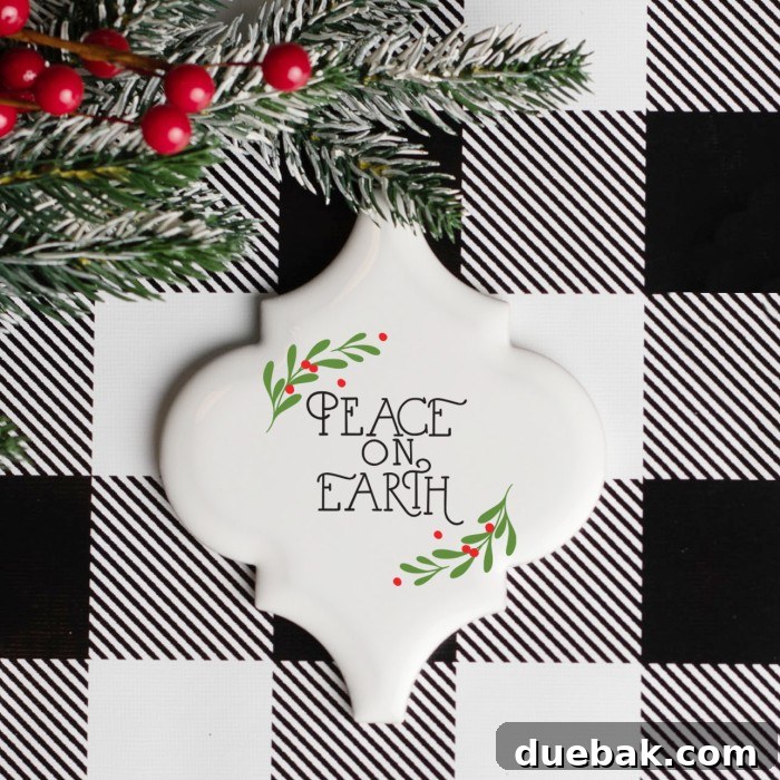 Close-up of a 'Peace On Earth' arabesque tile ornament