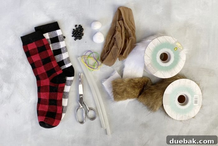 Materials laid out for making DIY gnomes, including socks, rice, and faux fur