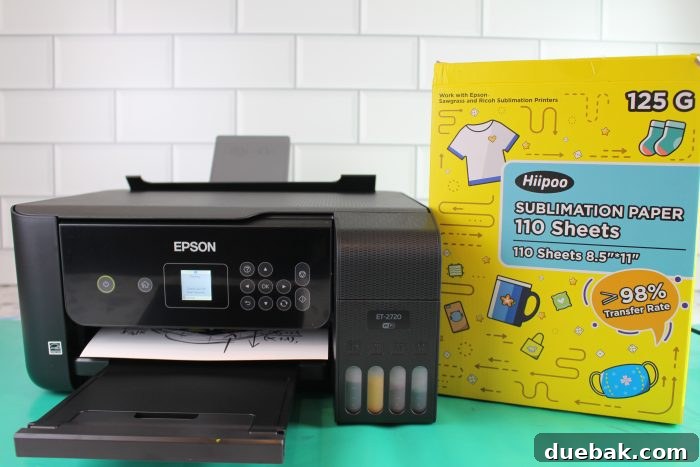 Unlock Sublimation Printing with Your EcoTank 15 Sublimation paper being loaded into the rear tray of an Epson EcoTank printer.
