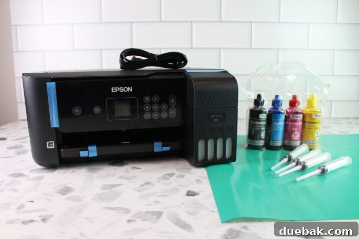 Unlock Sublimation Printing with Your EcoTank 3 Epson EcoTank printer with its ink tanks clearly visible, ready for refilling.