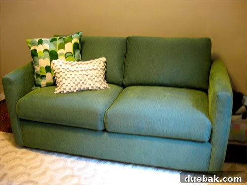 New Rowe sleeper sofa in a blue-green color.