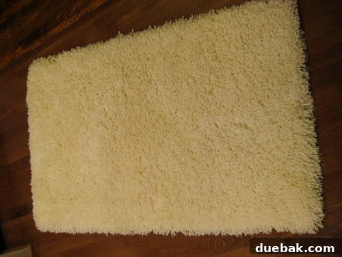 A large, fluffy shag rug found at Marshall's, ready to be transformed into faux sheepskin.