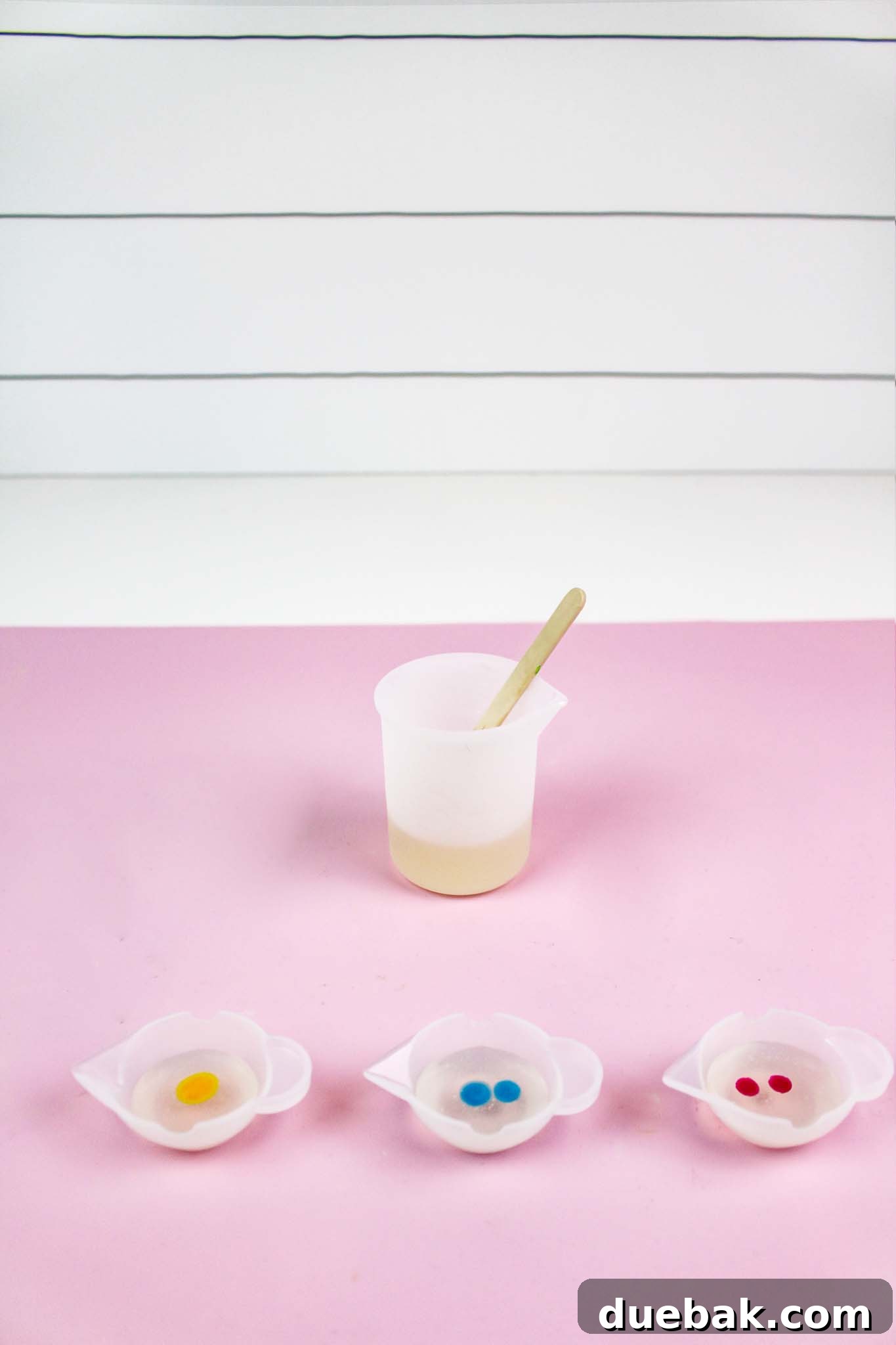 Resin mixed with different colors in separate cups