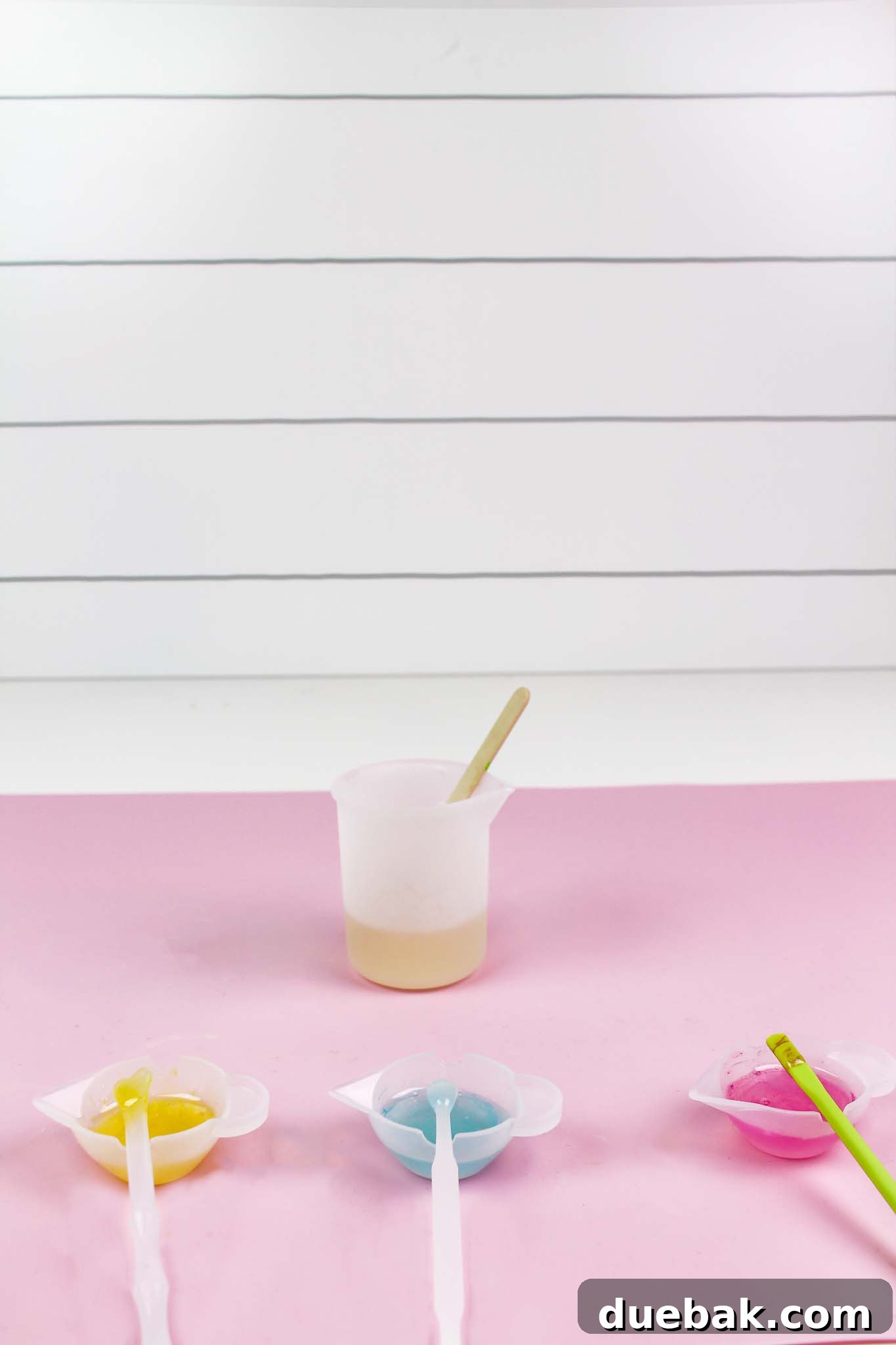 Resin being poured into letter molds