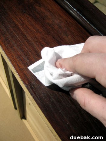 Wiping Excess Stain from Dresser Surface