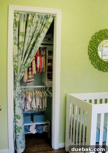 Close-up of organized baby clothes and cubbies