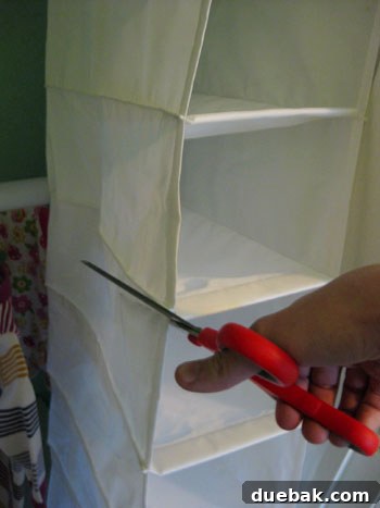 IKEA shoe organizer being cut down to size