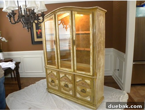 Dark, traditional china cabinet before makeover