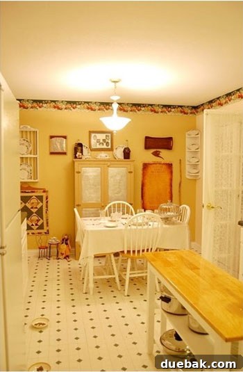 Close-up of the old kitchen showing an old range and dated backsplash.