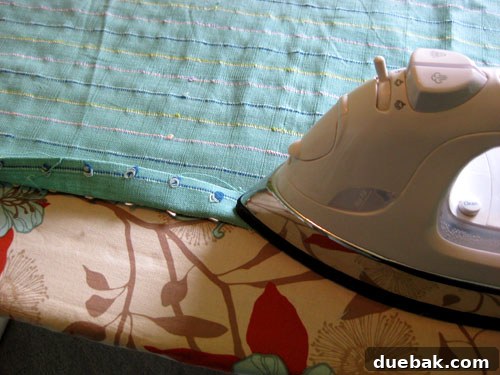 Folding and ironing hemmed edge