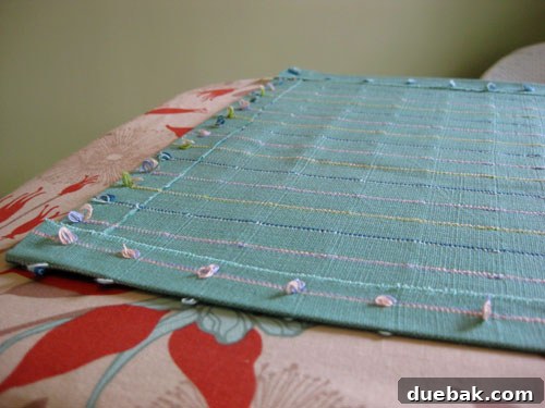 Finished hemmed fabric panel