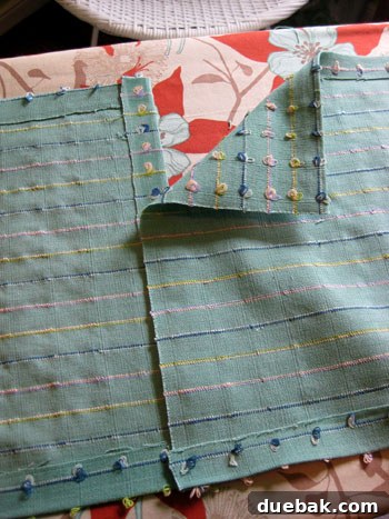 Joining fabric panels with hem tape