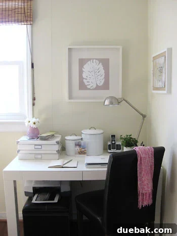A brightly colored floral scarf draped over a chair, adding a touch of spring to a home office or mudroom.