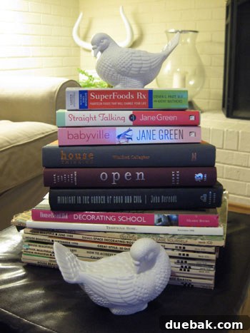 Delicate ceramic bird figurines displayed on a surface, adding a sweet, natural touch to spring decor.