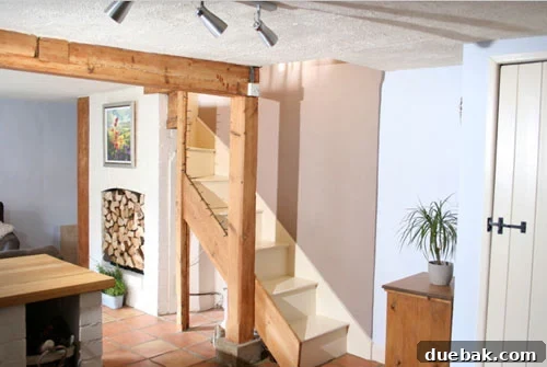 Our Unfiltered Opinions on 8 Decor Dilemmas 10 exposed light wood beam in english cottage including exposed staircase