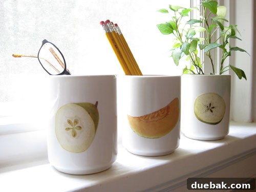 Decorative cup used as a stylish holder for pens on a desk
