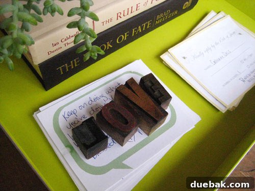 Wood block printing letters used as a personalized decor element on a shelf