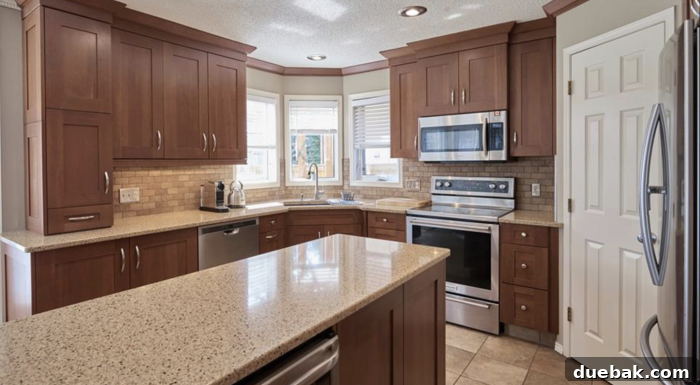 Revamp Your Granite Countertops with Paint 2 Before image of the kitchen countertops with dark granite.