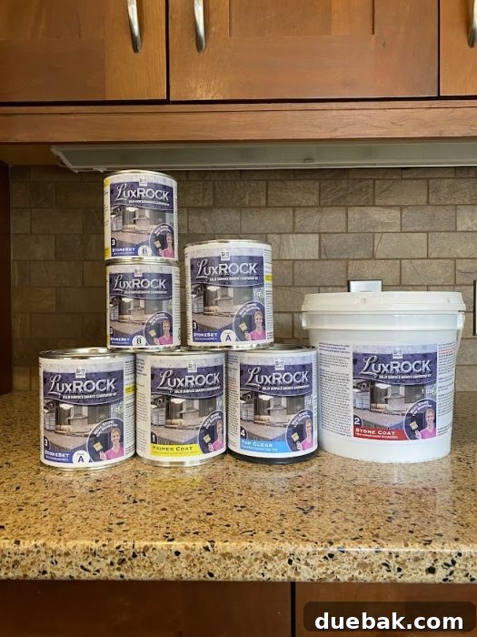 Revamp Your Granite Countertops with Paint 6 LuxRock countertop resurfacing kit components in the box.