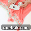 fringe pom pom trim on towel