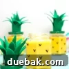 candles in a jar that look like a pineapple