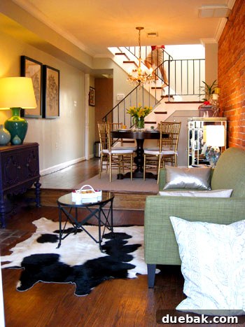 Step Inside This Exquisite City Residence 3 Living room of Adam and Amber's D.C. rowhouse, featuring a small-scale sofa and inviting decor.