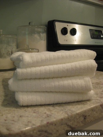 Woman cleaning kitchen with natural products