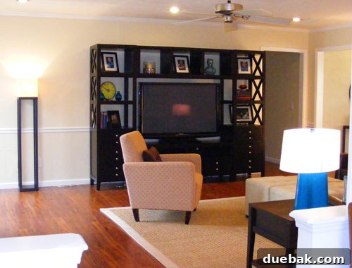 Elegant fireplace mantel with artistic decor and glass vases.