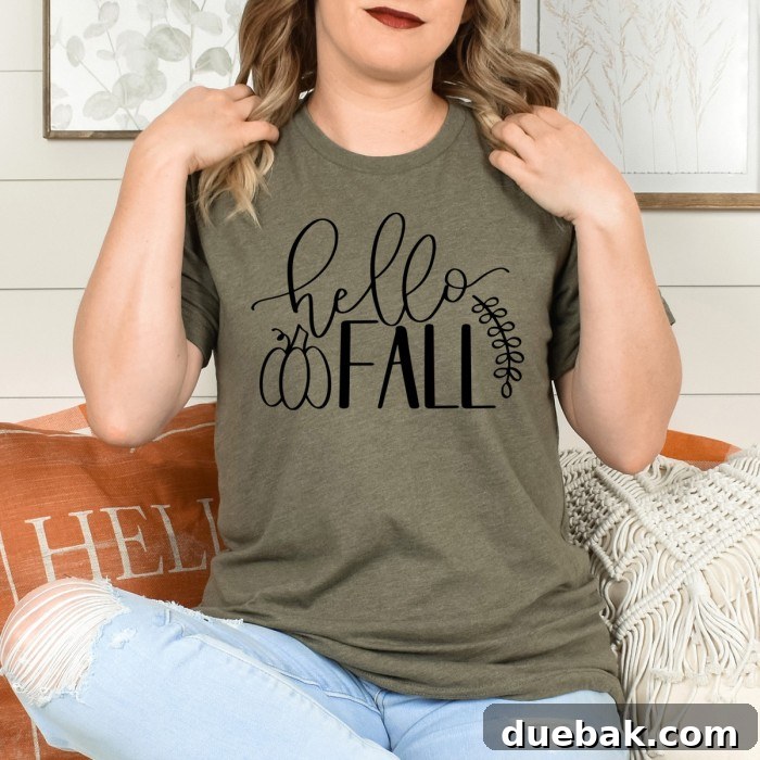 Heathered grey-green shirt with a cheerful 'Hello Fall' design.