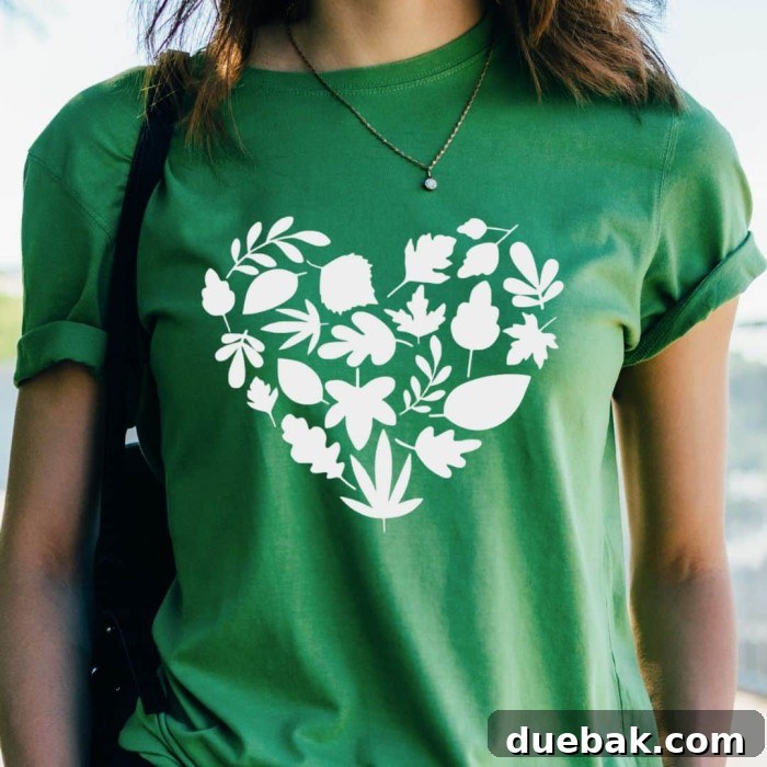 Heart shape formed by colorful fall leaves.