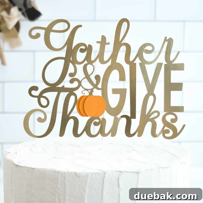 Cake topper that says 'Gather and Give Thanks' for Thanksgiving.
