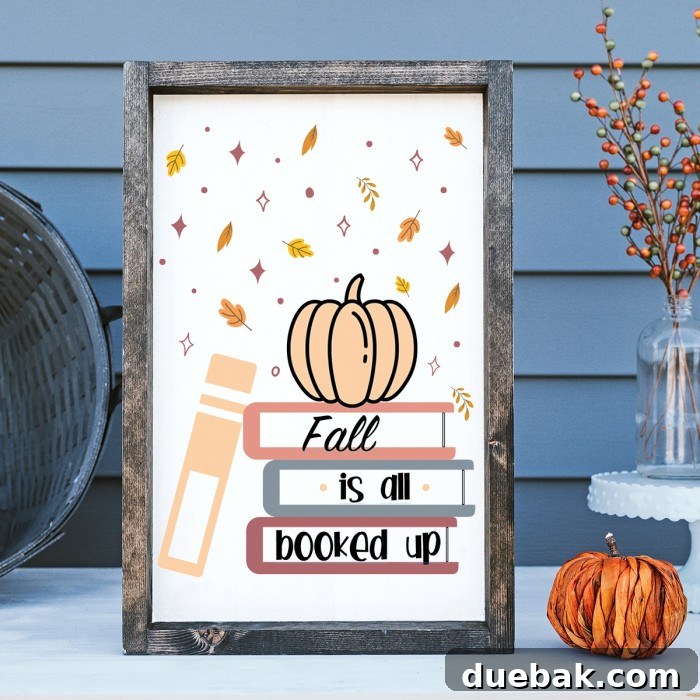 Wood sign with a pumpkin and books, stating 'Fall Is All Booked Up'.