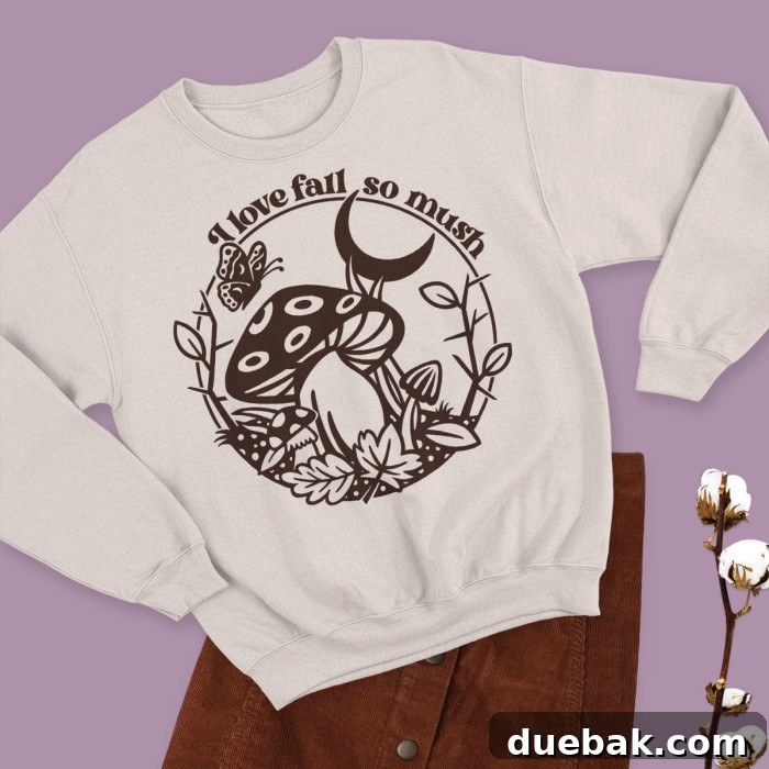 Cream crewneck sweatshirt with 'I Love Fall So Mush' mushroom design.