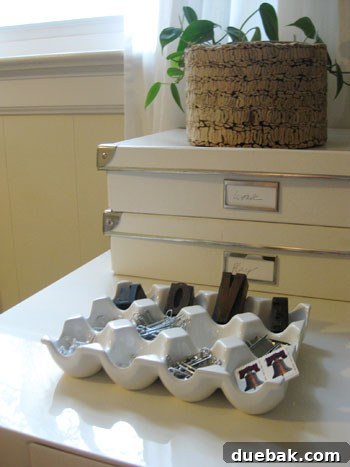 Overall view of the natural and textured home office desk, including the 'LOVE' wood blocks.