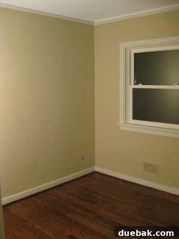 Emerald and Aqua Dreams for Our Girl 2 Before photo of an empty, bland room that will become the nursery