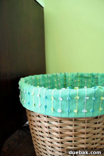 Emerald and Aqua Dreams for Our Girl 12 Close-up of a small basket next to the dresser in the nursery