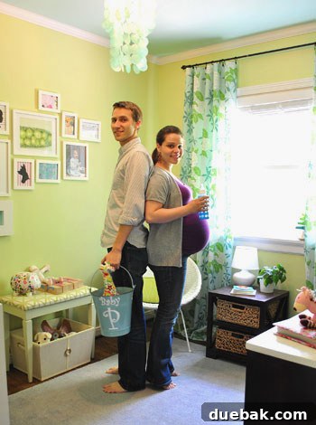 Emerald and Aqua Dreams for Our Girl 25 After photo of the finished nursery with the pregnant homeowner in the same pose, showing a larger baby bump