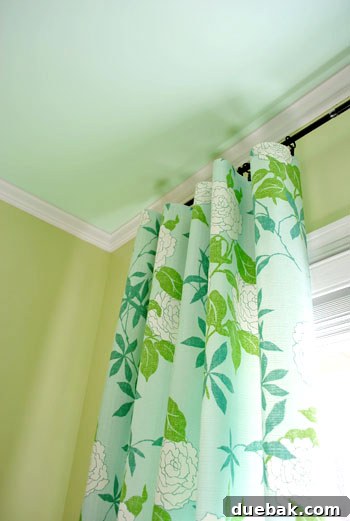 Emerald and Aqua Dreams for Our Girl 10 Nursery ceiling painted in soft aqua with pear green walls and white trim