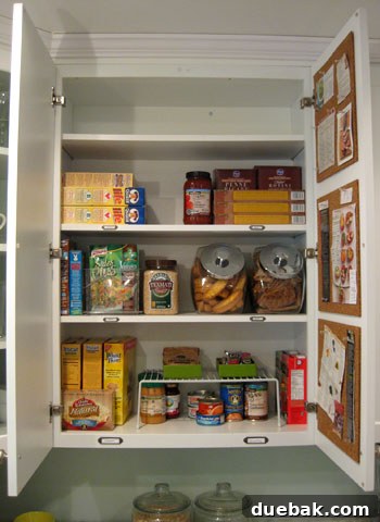 After: Neatly organized kitchen cabinet with categorized food items and labels